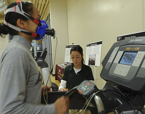 Woman researcher conducting a VO2 Max test