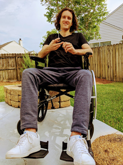 Robert in a wheel chair