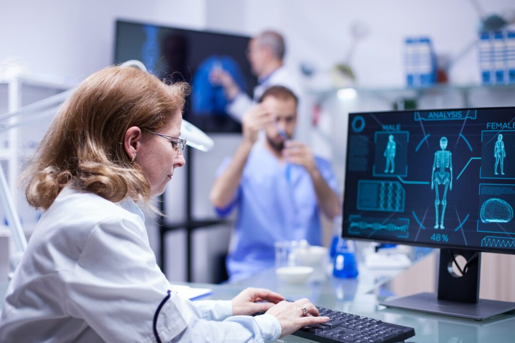 Woman working with computer in a laboratory