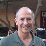The image is a headshot of Dr. David L. Kaufman.
