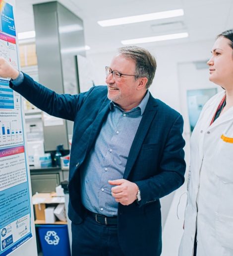 Evguenia Nepotchatykh and Alain Moreau looking at board